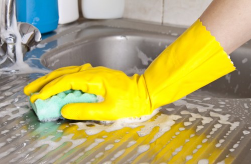 Trained technician using professional carpet cleaning equipment