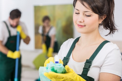Cleaner using protective equipment during a carpet cleaning job
