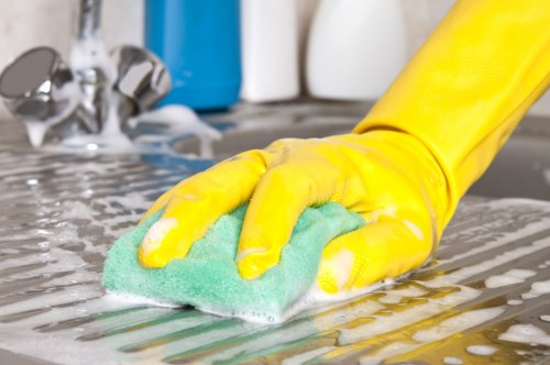 Deep upholstery cleaning removing stains from a fabric sofa
